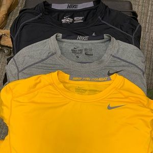 Nike pro combat shirts size M.